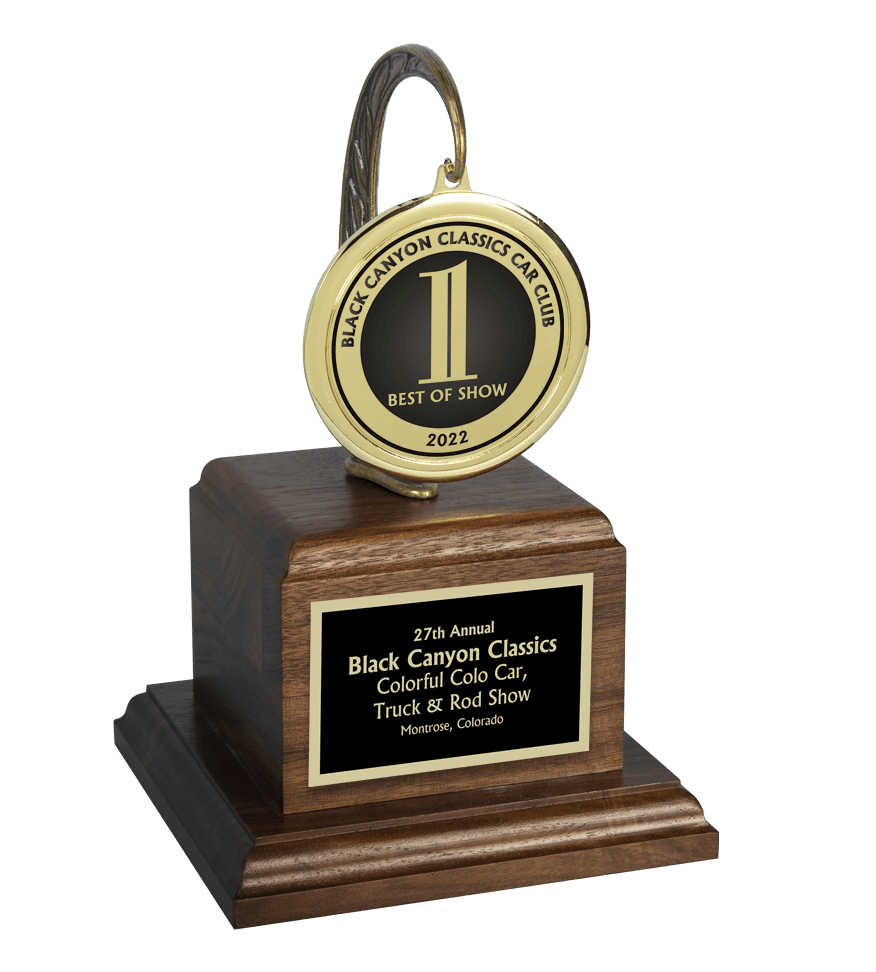 cross country gold medal track with black/gold drape trophy award 