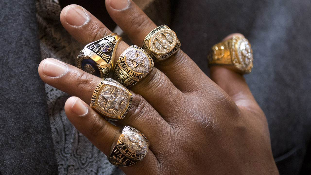 custom championship rings on fingers